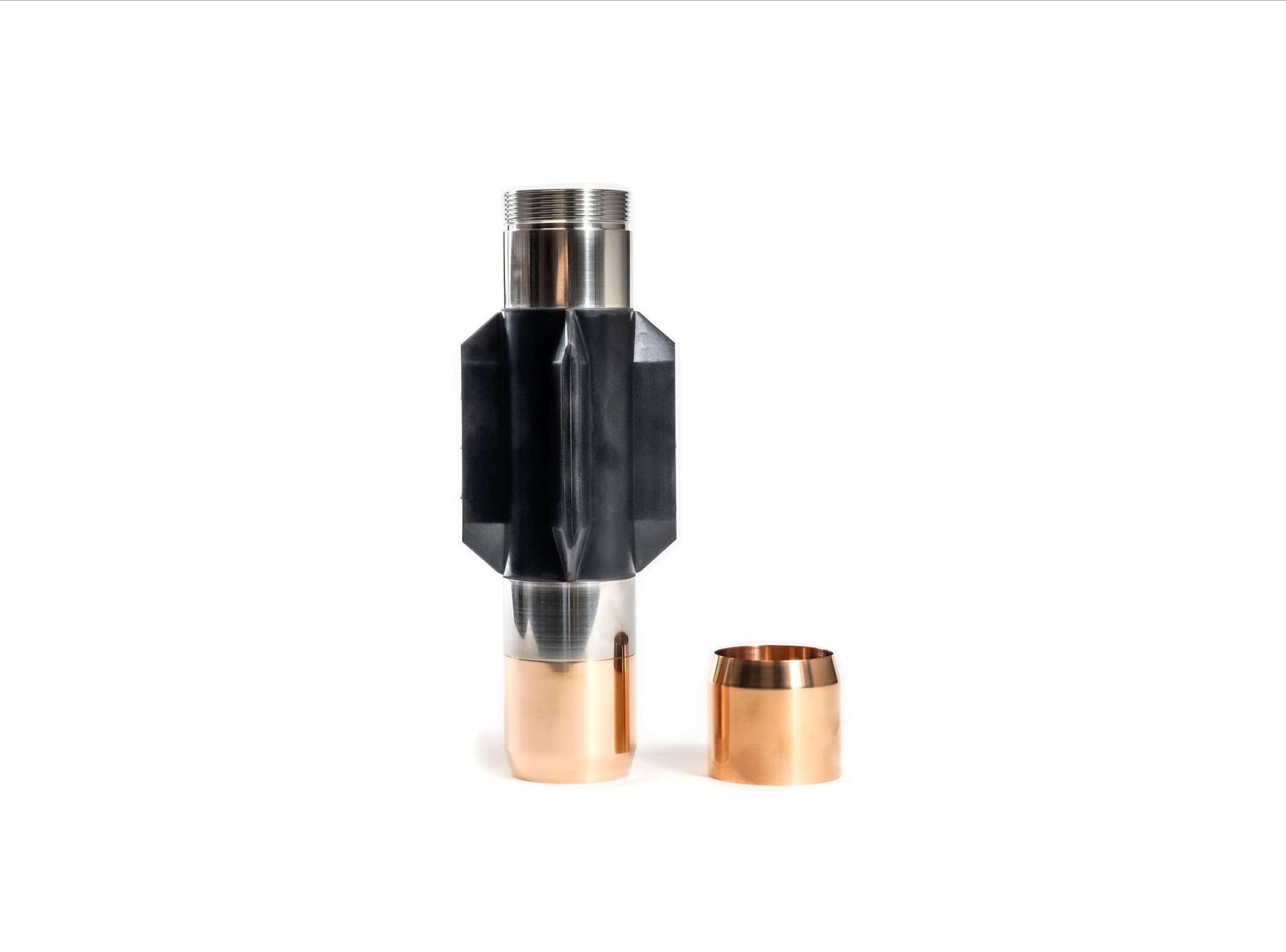 Metal tube with four black fins in the center and brass caps on both ends